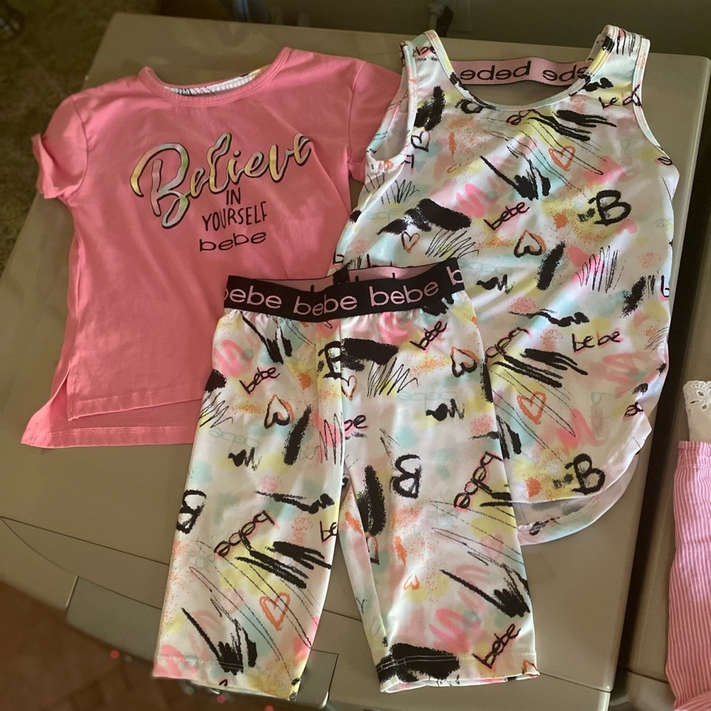 Bebe sport girls matching shirt, tank top, and shorts. Size 7/8